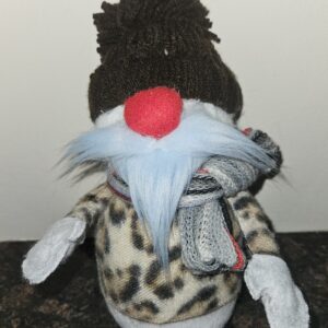 Handmade snowman gnome with blue beard, red nose, leopard-print sweater, brown yarn hat, and knit scarf.
