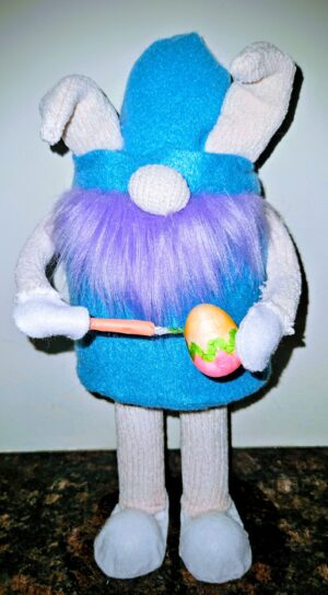 One-of-a-kind Legs 12.75 inch handmade Easter bunny gnome with long white legs, blue felt body, purple beard, bunny ears, holding painted egg