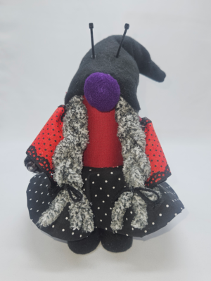Handmade Leidy Bugg ladybug gnome with antennae, polka dots, and long braids by Metamorphosis by Babs