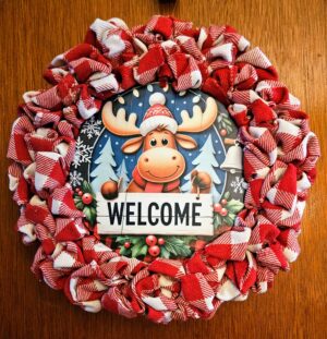 Winter moose wreath with red and white plaid ribbon, Christmas moose sign, and Welcome sign