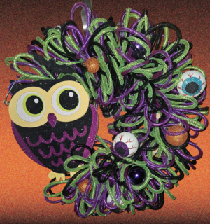 Halloween owl wreath with purple, green and black glitter mesh loops and eyeball ornaments, 20 inch round